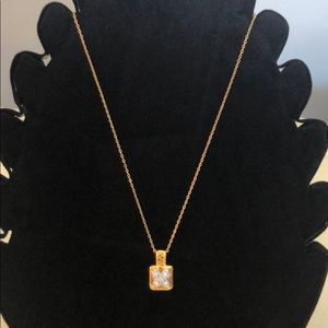 Gorgeous rich gold tone x pendant necklace